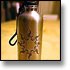 Jessica Williams' Tribal Sun design etched onto a stainless steel water bottle